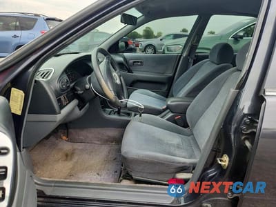 Zdjęcie 7 z 12 samochodu: 1997 NISSAN ALTIMA XE VIN:1N4BU31D0VC108548 - miniatura