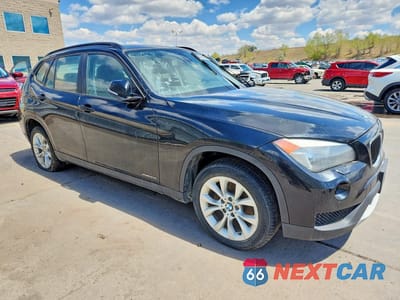 Czwarte zdjęcie samochodu z boku: 2013 BMW X1 XDRIVE28I VIN:WBAVL1C57DVR87518 - miniatura