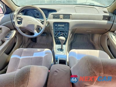 Zdjęcie 8 z 12 samochodu: 1999 TOYOTA CAMRY LE VIN:4T1BG22K6XU918929 - miniatura