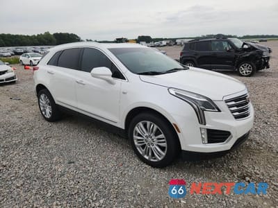 Czwarte zdjęcie samochodu z boku: 2018 CADILLAC XT5 PREMIUM LUXURY VIN:1GYKNERS1JZ131232 - miniatura
