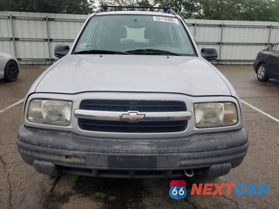 Piąte zdjęcie samochodu w środku: 1999 CHEVROLET TRACKER VIN:2CNBJ13C8X6917086 - miniatura