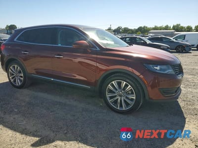 Czwarte zdjęcie samochodu z boku: 2016 LINCOLN MKX RESERVE VIN:2LMTJ8LPXGBL42355 - miniatura