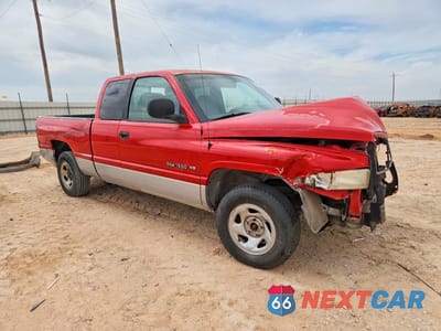 Czwarte zdjęcie samochodu z boku: 2000 DODGE RAM 1500 VIN:3B7HC12Y6YG157171 - miniatura