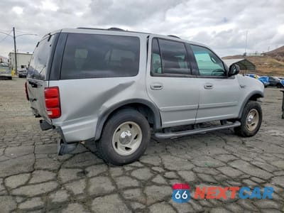 Trzecie zdjęcie samochodu z tyłu: 1999 FORD EXPEDITION VIN:1FMPU18L7XLB85062 - miniatura