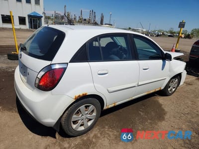 Trzecie zdjęcie samochodu z tyłu: 2010 KIA RIO5 LX VIN:KNADH5B31A6630538 - miniatura