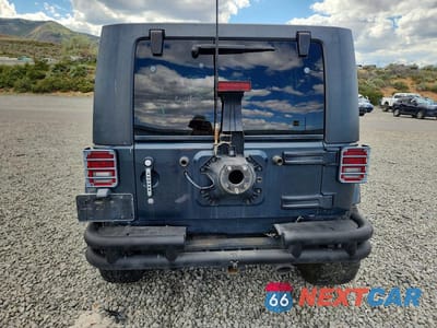 Zdjęcie 6 z 14 samochodu: 2007 JEEP WRANGLER SAHARA VIN:1J4GA59167L123079 - miniatura