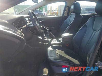 Zdjęcie 7 z 12 samochodu: 2013 FORD FOCUS TITANIUM VIN:1FADP3J26DL276207 - miniatura