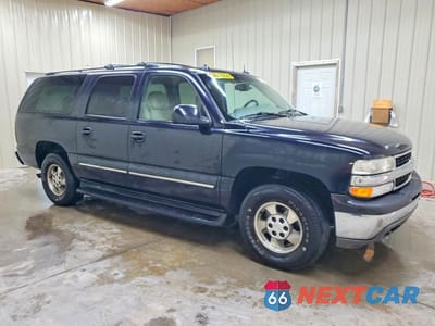 Czwarte zdjęcie samochodu z boku: 2003 CHEVROLET SUBURBAN C1500 VIN:1GNEC16Z03J314715 - miniatura