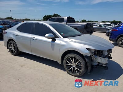 Czwarte zdjęcie samochodu z boku: 2024 TOYOTA CAMRY SE VIN:4T1G11AK0RU228955 - miniatura