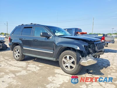 Czwarte zdjęcie samochodu z boku: 2009 JEEP GRAND CHEROKEE LAREDO VIN:1J8GR48K29C553383 - miniatura