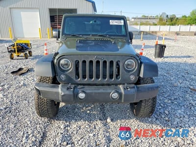 Piąte zdjęcie samochodu w środku: 2016 JEEP WRANGLER UNLIMITED SPORT VIN:1C4BJWDG1GL148196 - miniatura