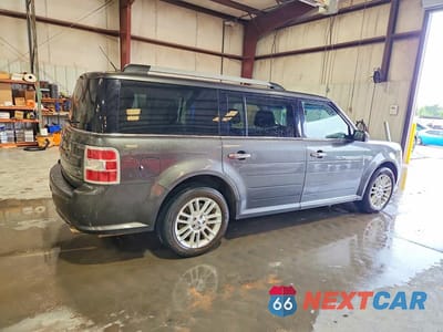 Trzecie zdjęcie samochodu z tyłu: 2019 FORD FLEX SEL VIN:2FMGK5C87KBA26762 - miniatura