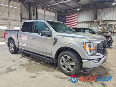 Czwarte zdjęcie samochodu z boku: 2021 FORD F150 SUPERCREW VIN:1FTFW1ED5MFB27291 - miniatura
