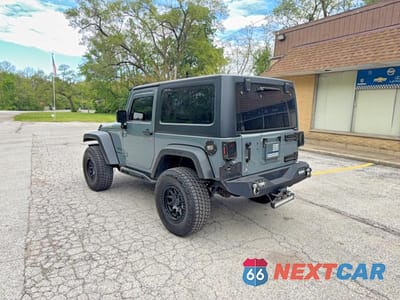 Trzecie zdjęcie samochodu z tyłu: 2015 JEEP WRANGLER SPORT VIN:1C4AJWAG8FL718516 - miniatura
