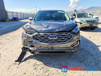 Piąte zdjęcie samochodu w środku: 2022 FORD EDGE TITANIUM VIN:2FMPK4K96NBB03629 - miniatura