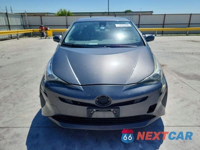 Piąte zdjęcie samochodu w środku: 2018 TOYOTA PRIUS TWO VIN:JTDKBRFU2J3067524 - miniatura