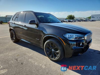Czwarte zdjęcie samochodu z boku: 2015 BMW X5 XDRIVE50I VIN:5UXKR6C51F0J75339 - miniatura