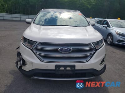 Piąte zdjęcie samochodu w środku: 2016 FORD EDGE TITANIUM VIN:2FMPK4K93GBB55559 - miniatura