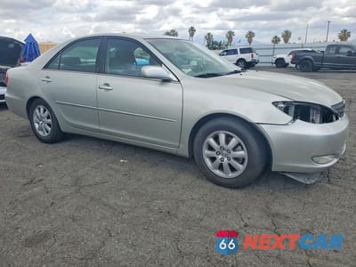 Czwarte zdjęcie samochodu z boku: 2003 TOYOTA CAMRY XLE VIN:JTDBE32K530154637 - miniatura