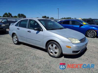 Czwarte zdjęcie samochodu z boku: 2007 FORD FOCUS ZX4 VIN:1FAHP34N07W230186 - miniatura
