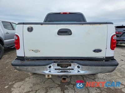 Zdjęcie 6 z 12 samochodu: 2002 FORD F150 SUPERCREW VIN:1FTRW08682KB34597 - miniatura