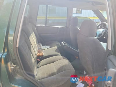 Zdjęcie 10 z 12 samochodu: 1998 JEEP GRAND CHEROKEE LAREDO VIN:1J4GZ58S2WC284191 - miniatura