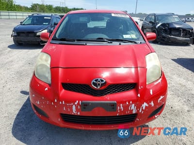 Piąte zdjęcie samochodu w środku: 2009 TOYOTA YARIS BASE VIN:JTDJT903X95237122 - miniatura