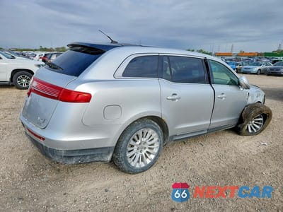 Trzecie zdjęcie samochodu z tyłu: 2010 LINCOLN MKT VIN:2LMHJ5AR8ABJ30456 - miniatura