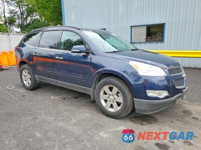 Czwarte zdjęcie samochodu z boku: 2012 CHEVROLET TRAVERSE LT VIN:1GNKVGED0CJ235504 - miniatura