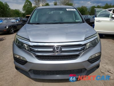 Piąte zdjęcie samochodu w środku: 2016 HONDA PILOT LX VIN:5FNYF6H15GB086614 - miniatura