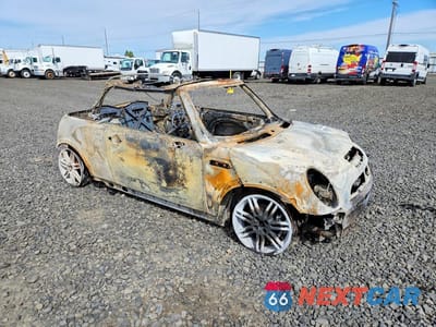 Czwarte zdjęcie samochodu z boku: 2005 MINI COOPER S VIN:WMWRH33455TF83252 - miniatura