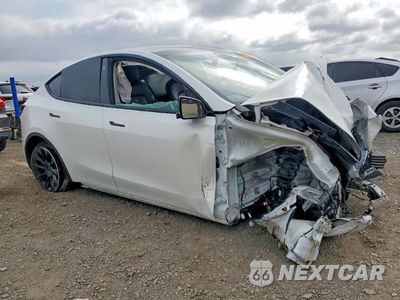 Czwarte zdjęcie samochodu z boku: 2021 TESLA MODEL Y VIN:5YJYGDEE1MF199531 - miniatura