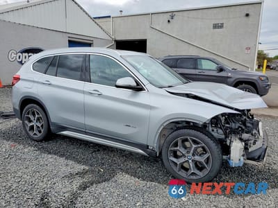 Czwarte zdjęcie samochodu z boku: 2018 BMW X1 XDRIVE28I VIN:WBXHT3C36J5F93195 - miniatura