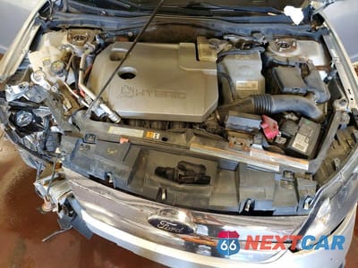 Zdjęcie 11 z 13 samochodu: 2012 FORD FUSION HYBRID VIN:3FADP0L34CR351054 - miniatura
