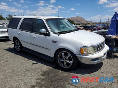 Czwarte zdjęcie samochodu z boku: 1997 FORD EXPEDITION VIN:1FMEU18W0VLB34677 - miniatura