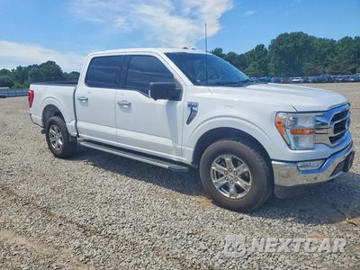 Czwarte zdjęcie samochodu z boku: 2022 FORD F150 SUPERCREW VIN:1FTFW1E51NKD02900 - miniatura