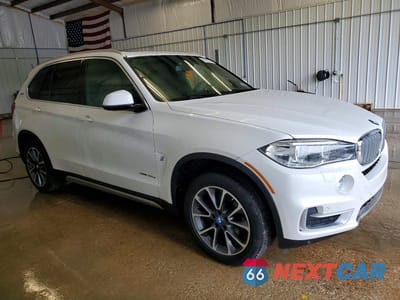 Czwarte zdjęcie samochodu z boku: 2017 BMW X5 XDR40E VIN:5UXKT0C32H0V97118 - miniatura
