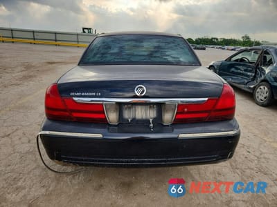 Zdjęcie 6 z 13 samochodu: 2003 MERCURY GRAND MARQUIS LS VIN:2MEFM75W83X663535 - miniatura