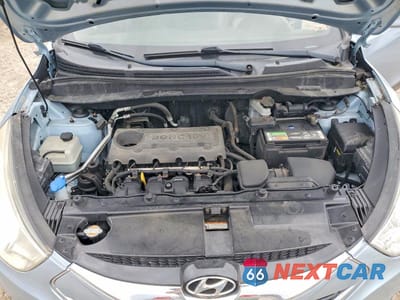 Zdjęcie 11 z 12 samochodu: 2010 HYUNDAI TUCSON VIN:KM8JU3AC8AU064473 - miniatura