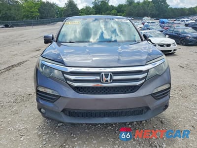 Piąte zdjęcie samochodu w środku: 2016 HONDA PILOT EX VIN:5FNYF5H3XGB025528 - miniatura