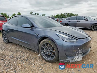 Czwarte zdjęcie samochodu z boku: 2021 TESLA MODEL 3 VIN:5YJ3E1EA9MF096059 - miniatura