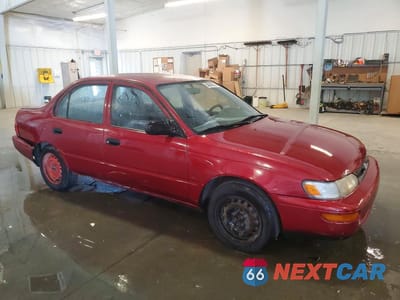 Czwarte zdjęcie samochodu z boku: 1993 TOYOTA COROLLA BASE VIN:1NXAE04E5PZ033862 - miniatura