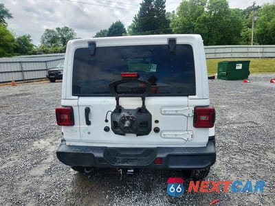 Zdjęcie 6 z 13 samochodu: 2019 JEEP WRANGLER UNLIMITED SAHARA VIN:1C4HJXENXKW520963 - miniatura