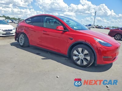 Czwarte zdjęcie samochodu z boku: 2023 TESLA MODEL Y VIN:7SAYGDEE2PF768457 - miniatura