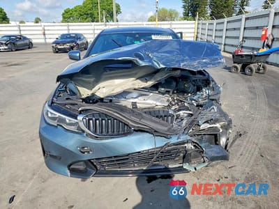 Piąte zdjęcie samochodu w środku: 2020 BMW 330I VIN:3MW5R1J04L8B35473 - miniatura