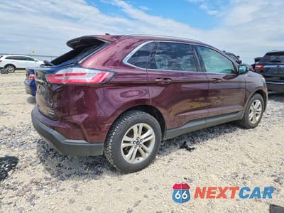 Trzecie zdjęcie samochodu z tyłu: 2019 FORD EDGE SEL VIN:2FMPK4J94KBB38876 - miniatura