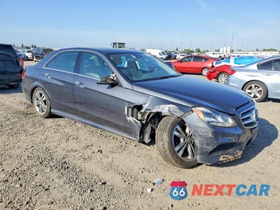 Czwarte zdjęcie samochodu z boku: 2014 MERCEDES-BENZ E 250 BLUETEC VIN:WDDHF0EB2EB027651 - miniatura