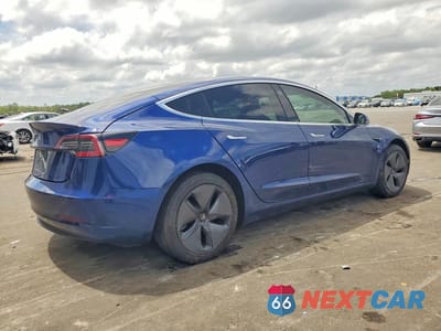 Trzecie zdjęcie samochodu z tyłu: 2018 TESLA MODEL 3 VIN:5YJ3E1EA0JF005580 - miniatura