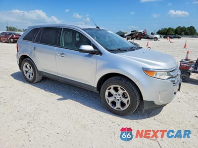 Czwarte zdjęcie samochodu z boku: 2011 FORD EDGE VIN:2FMDK3JC6BBB27094 - miniatura