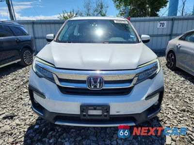 Piąte zdjęcie samochodu w środku: 2021 HONDA PILOT TOURING VIN:5FNYF6H99MB051916 - miniatura